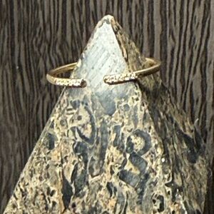 Stackable 14k diamond claw ring.